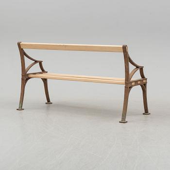 A late 19th century garden sofa by Byarum.