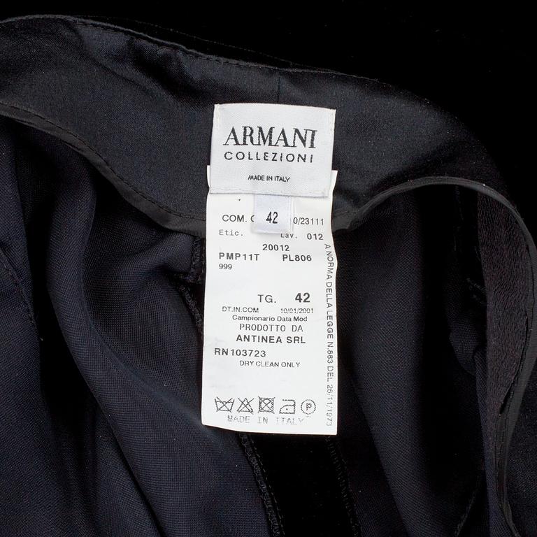 ARMANI, a pair of black velvet trousers and a west, size 42.