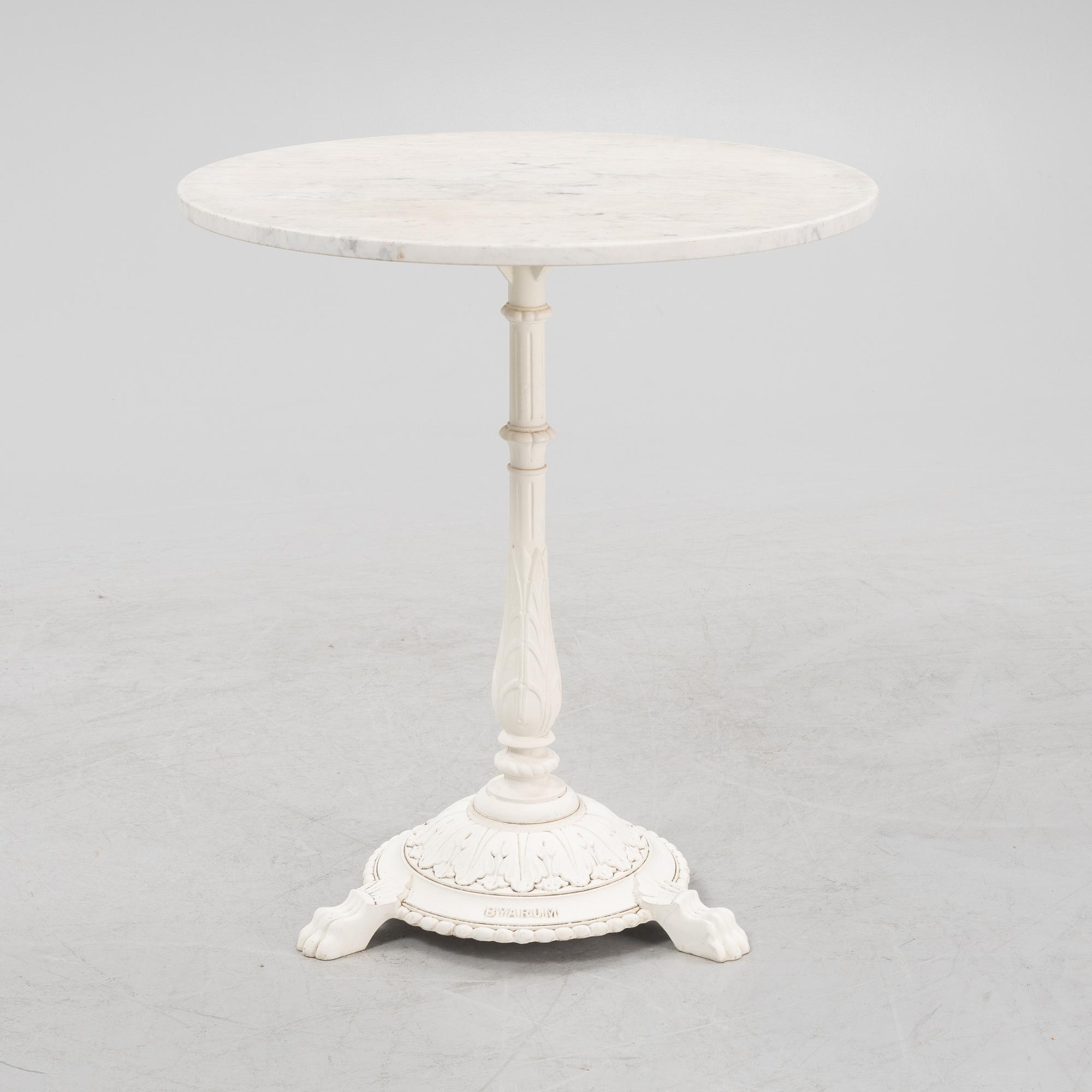 A Byarum garden table later part of the 20th century.