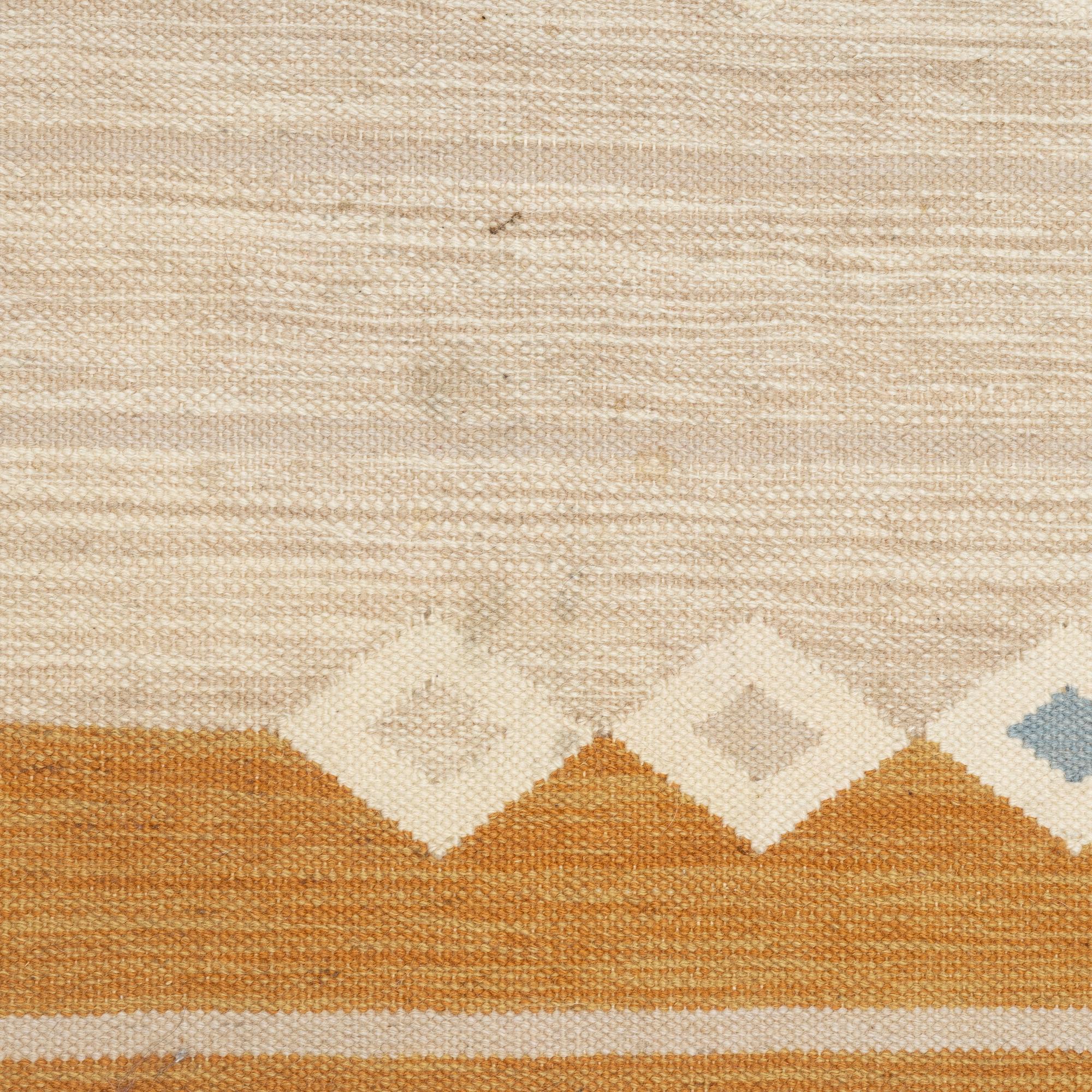 A flat weave carpet, signed Å, Axeco made in India, c. 280 x 196 cm.