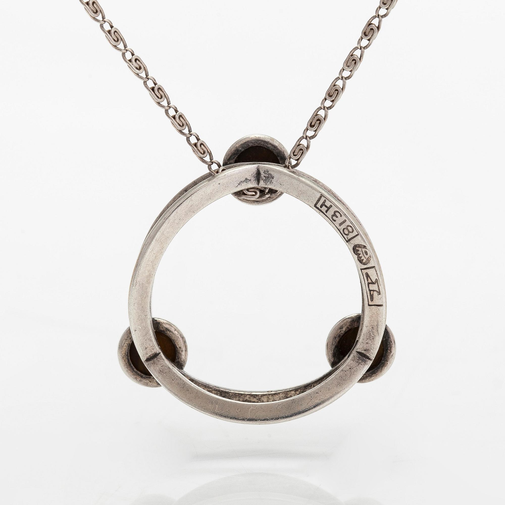 Elis Kauppi, a silver and tiger's eye pendant, Kupittaan Kulta, Turku. With chain in silver.
