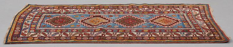 A RUG, a semi-antique Gendje probably, ca 209 x 124 cm.
