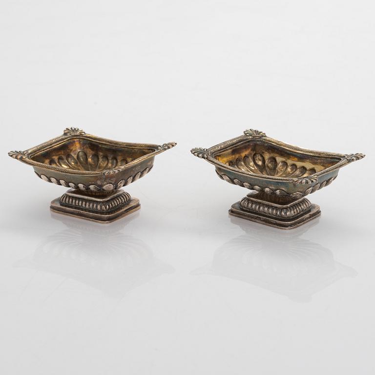 Two pairs of parcel-gilt salt cellars, latter half of the 19th century.