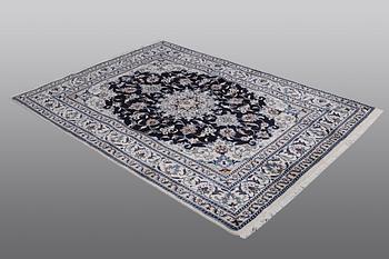 A carpet, Nain, part silk, ca 212 x 153 cm.