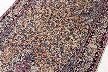 A semi antique Kirman rug, South Persia, c. 228 x 136 cm.