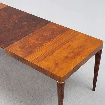 A Swedish Modern mahogany dining table, mid 20th Century.