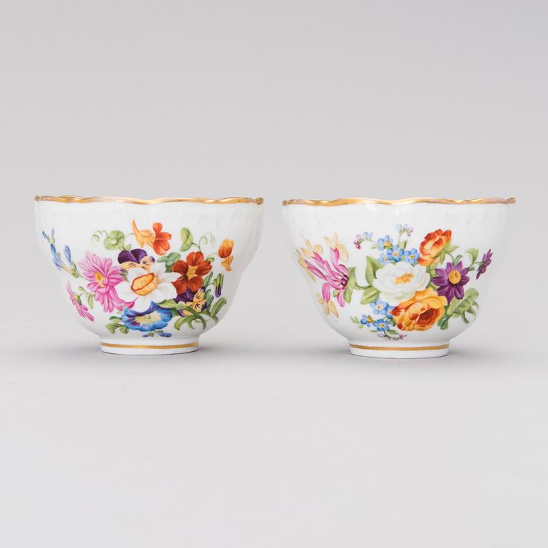 A pair of 19th century porcelain coffee cups, KPM Berlin 1849-1870.