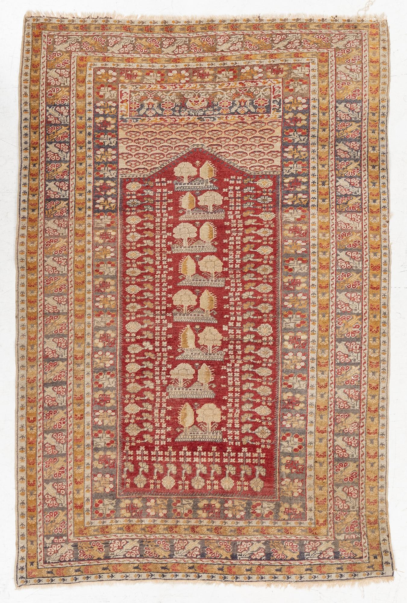 An oriental carpet, c. 195 x 70 cm.