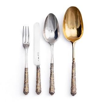 323. A Swedish parcel-gilt silver and filigree four-piece travel cutlery set, marks of Gustaf Otto Sjöberg, Falun 1813.