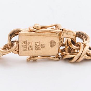ARMBAND, 18K guld bismarcklänk med 5  berlocker, 21,7 g, Esto AB Guldvarufirman Stockholm 1963.