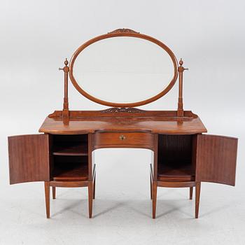 A mahogany veneered dressing table with a mirror, early 20th Century.