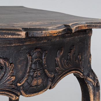 An 18h century rococo table.