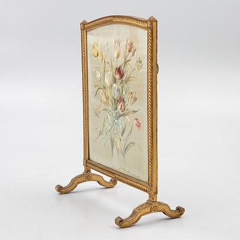 A Louix XVI-style fire guard, late 19th century.