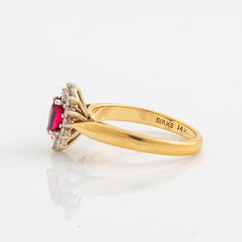 Navette cut ruby and brilliant cut diamond ring.