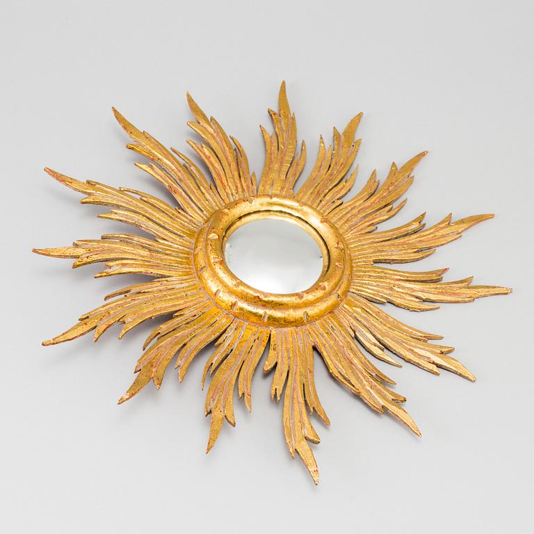 A mirror in shape of a sun, second half of the 20th century.