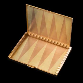 A CIGARETTE CASE, Cartier, 18K red- and yellow gold, sapphires. Cartier England 1956. Weight 215 g.