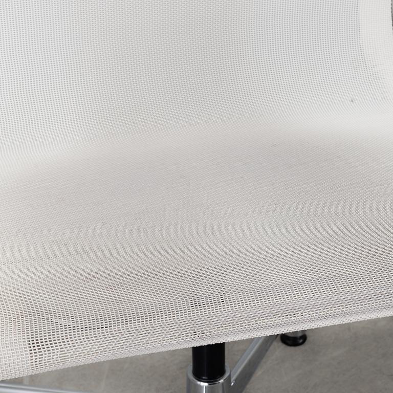 A pair of 'EA 108' desk chairs by Charles & Ray Eames for Vitra.