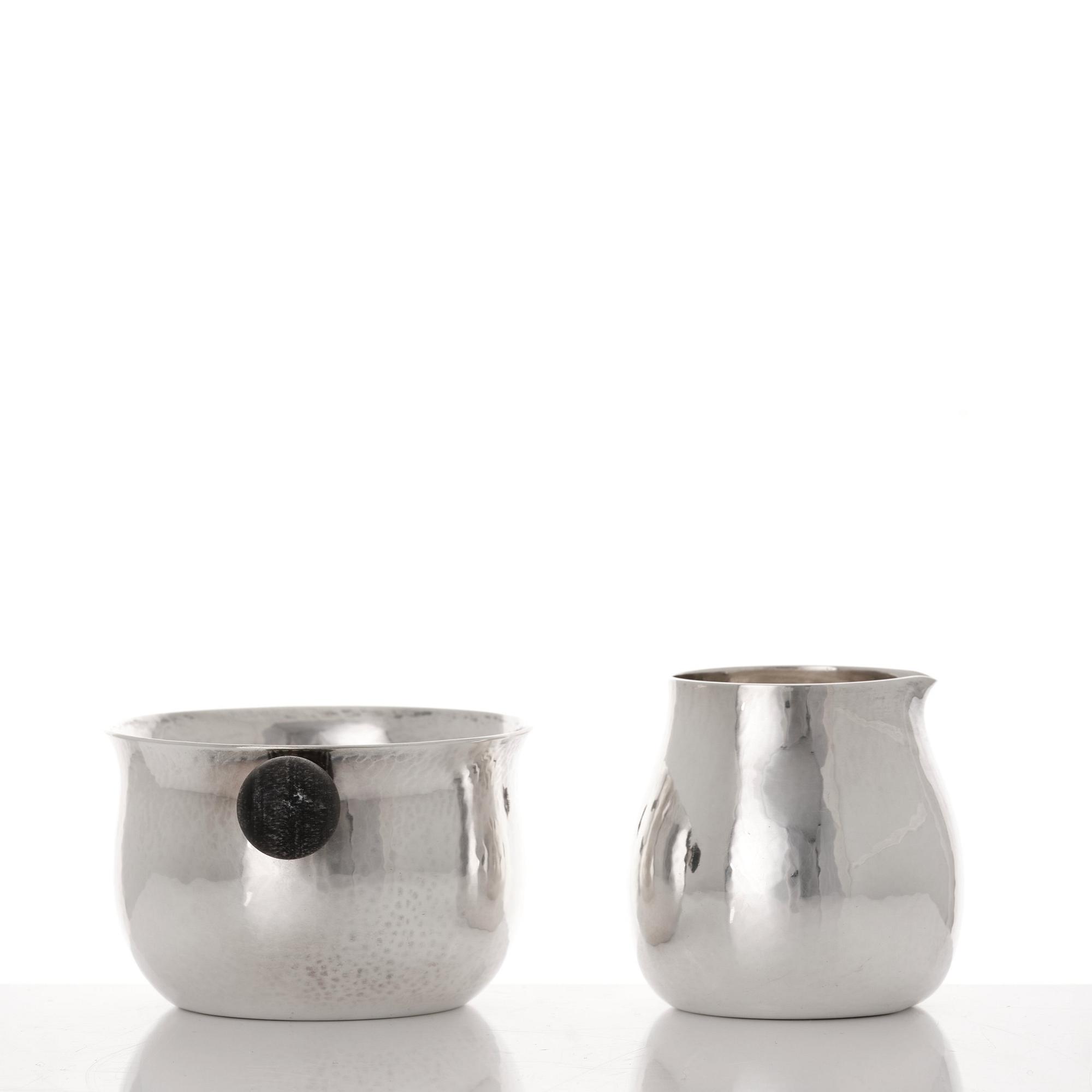 Georg Jensen, a set of three pieces of sterling coffee service, Copenhagen 1925-44 (the sugar bowl 1925-33), design nr 80 A and B.