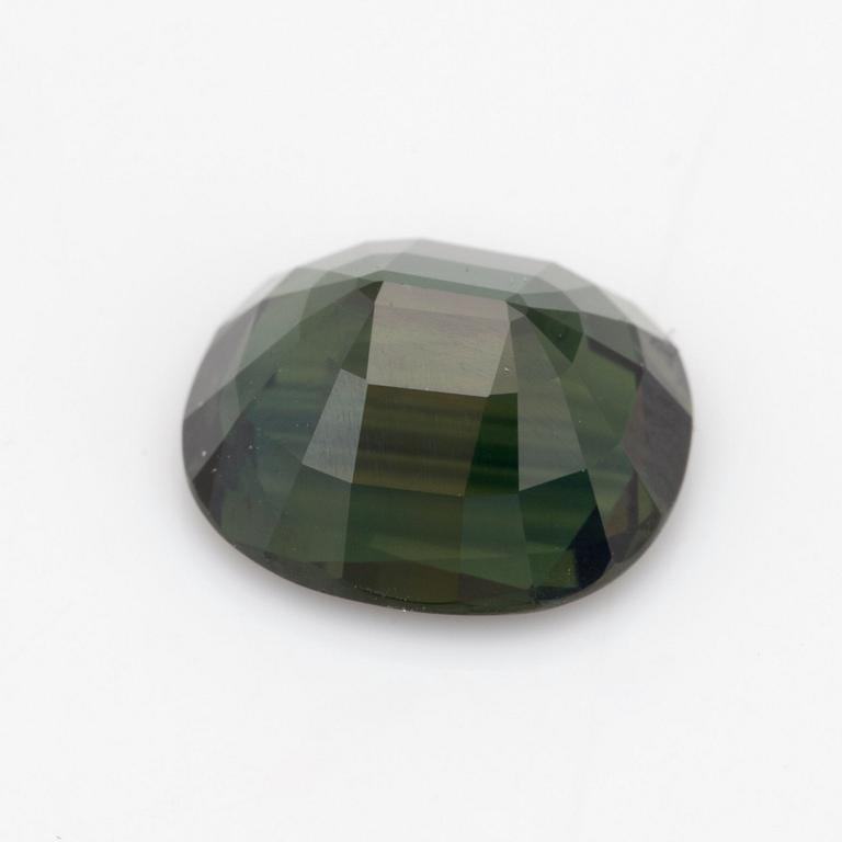 A 6.52 ct green sapphire.