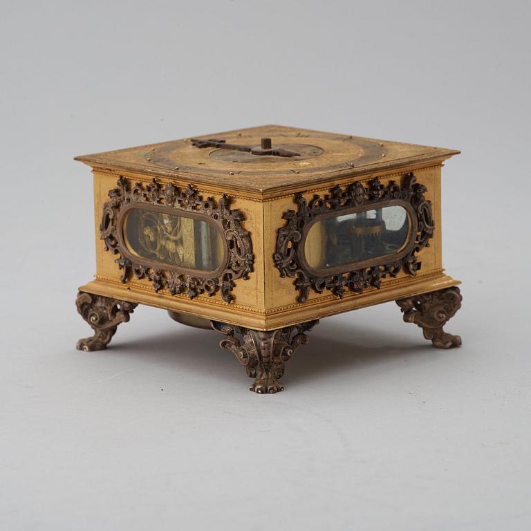 A Baroque 17th century traweller's clock in original case.