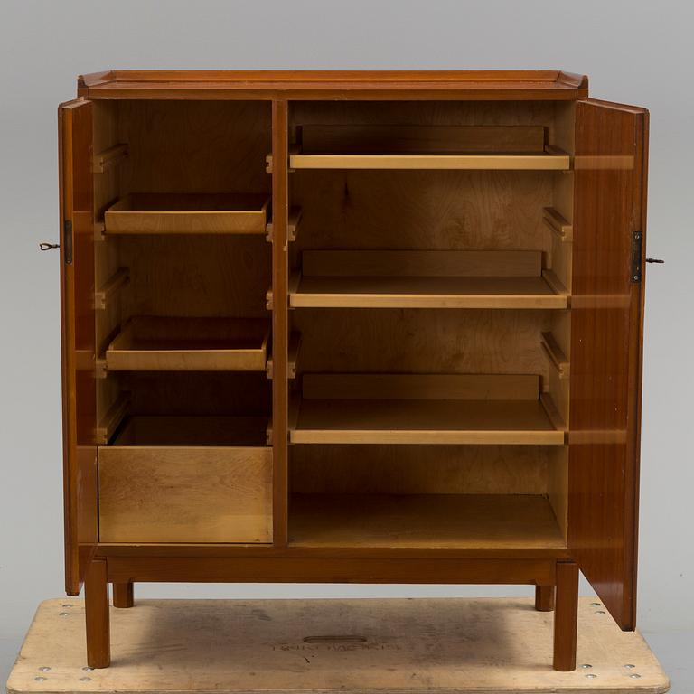 A cabinet by David Rosén for Nordiska Kompaniet dated 1954.