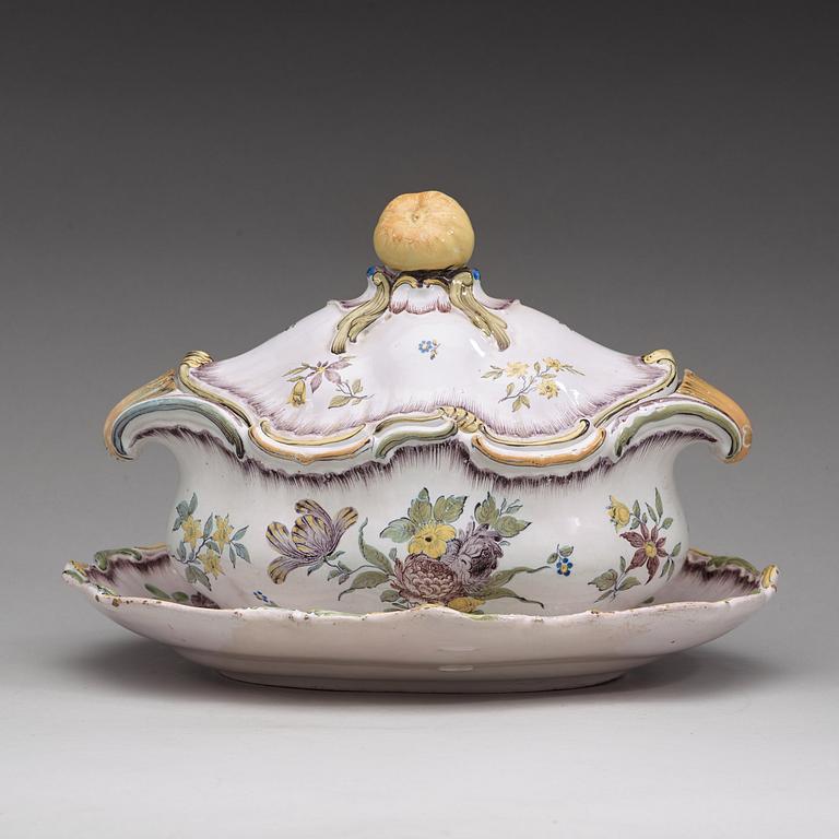 A Swedish faience tureen with cover and matched stand, Rörstrand, 18th Century.