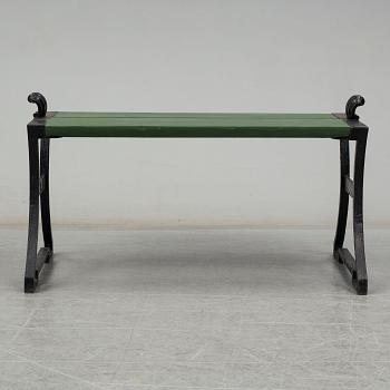 FOLKE BENSOW, a 'Snecan' cast iron carden bench from Byarums Bruk, sesigned in 1923.