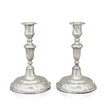 155. A pair of Rococo pewter candlesticks by C Sauer 1749.