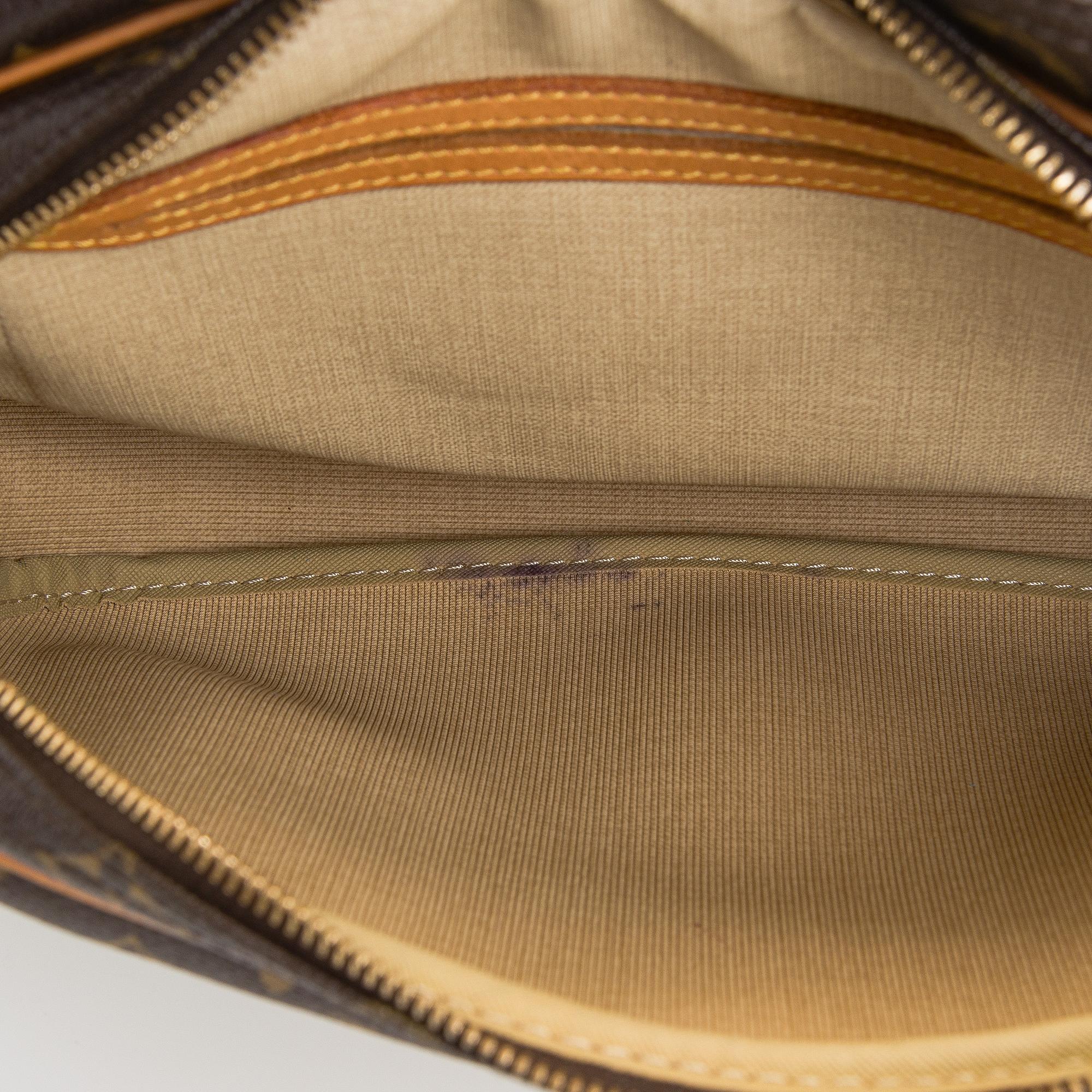 Louis Vuitton, a Monogram Canvas 'Reporter PM' shoulder bag.