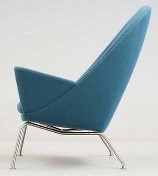 A Hans Wegner 'CH468' armchair, blue fabric, steel legs, Carl Hansen & Søn, Denmark.