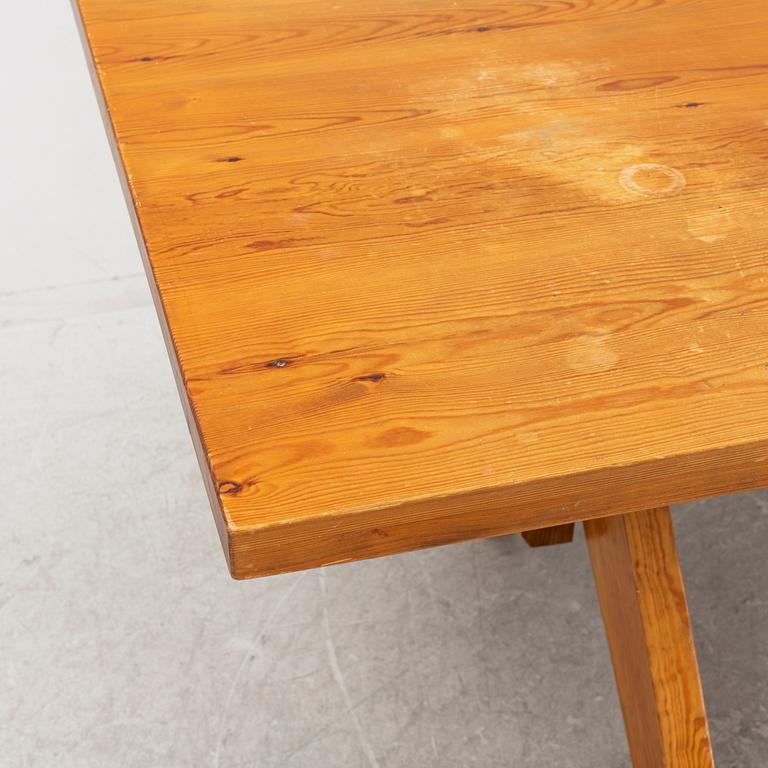 A pine trestle table, later part of the 20th Century.