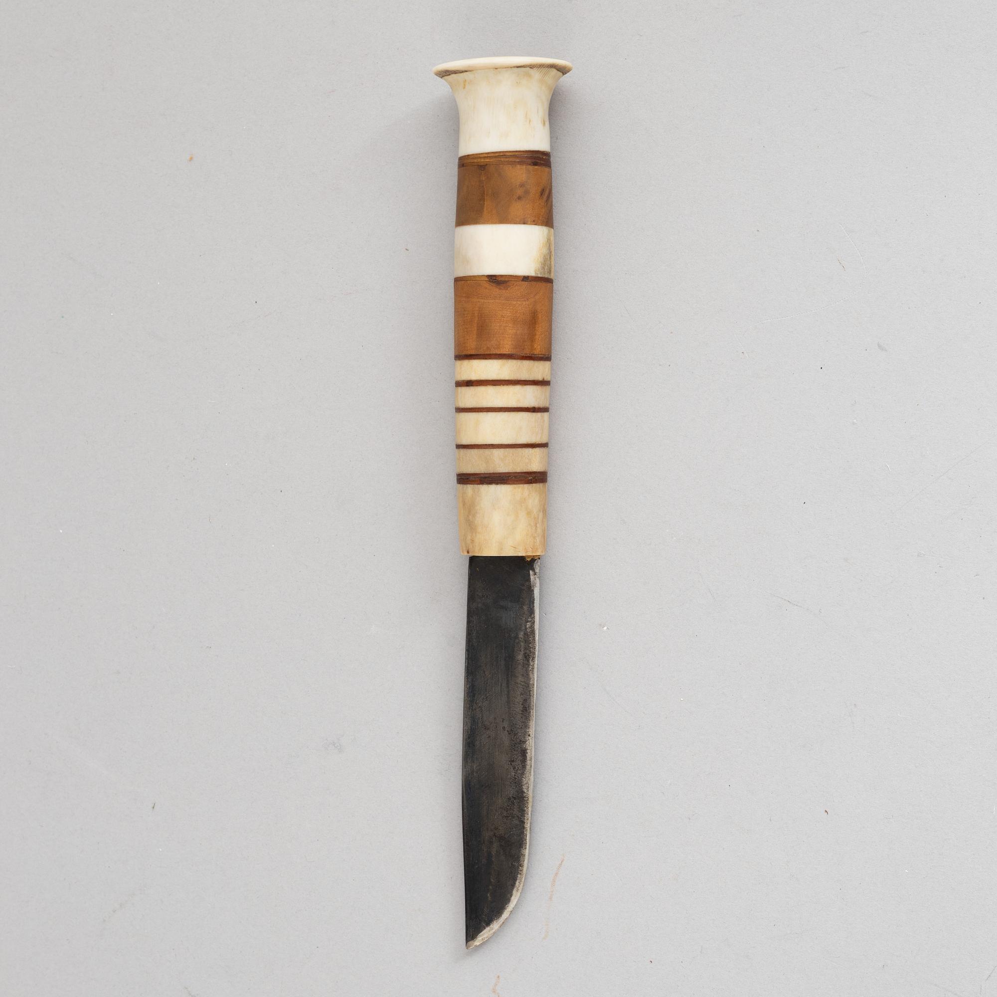 Lars Pirak, a reindeer horn knife, signed.