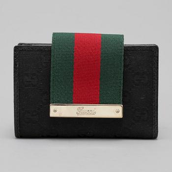 PLÅNBOK, Gucci, "continental wallet", 2000-tal.