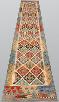 A Kilim rug, approx. 401 x 82 cm.