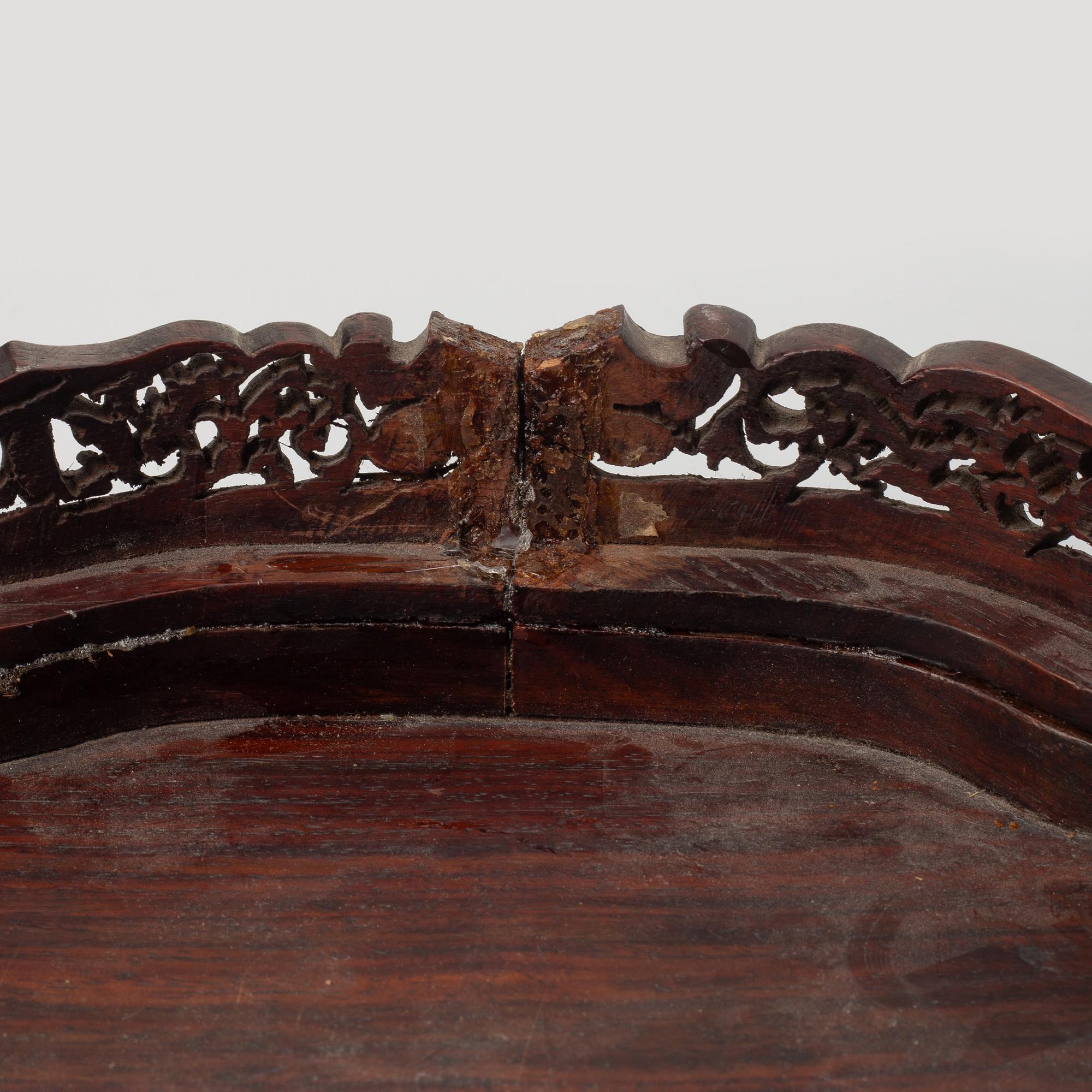 A group of Chinese hardwood stands and a cover, Qing dynasty and later.