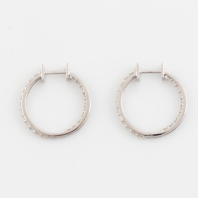 Brilliant cut diamond hoop earrings.
