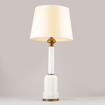 A glass and brass table lamp, mid/second half of the 20th century.