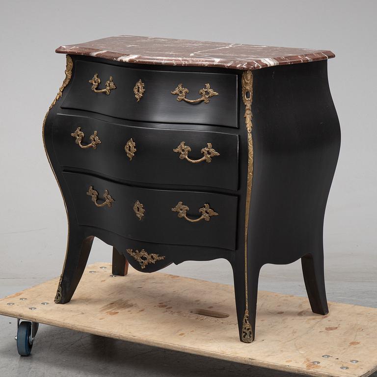 A mid 20th Century rococo style chest of drawers.