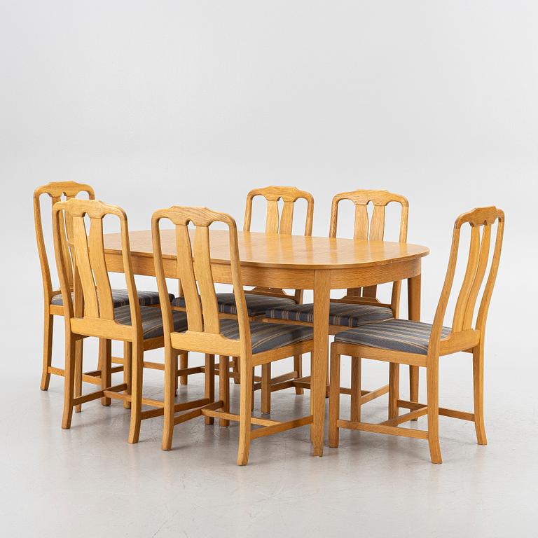 Carl Malmsten, Dining table with 6 chairs, “Ambassadör”, second half of the 20th century.