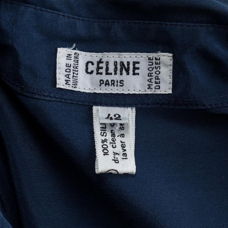 A navyblue silk blouse by Cèline.