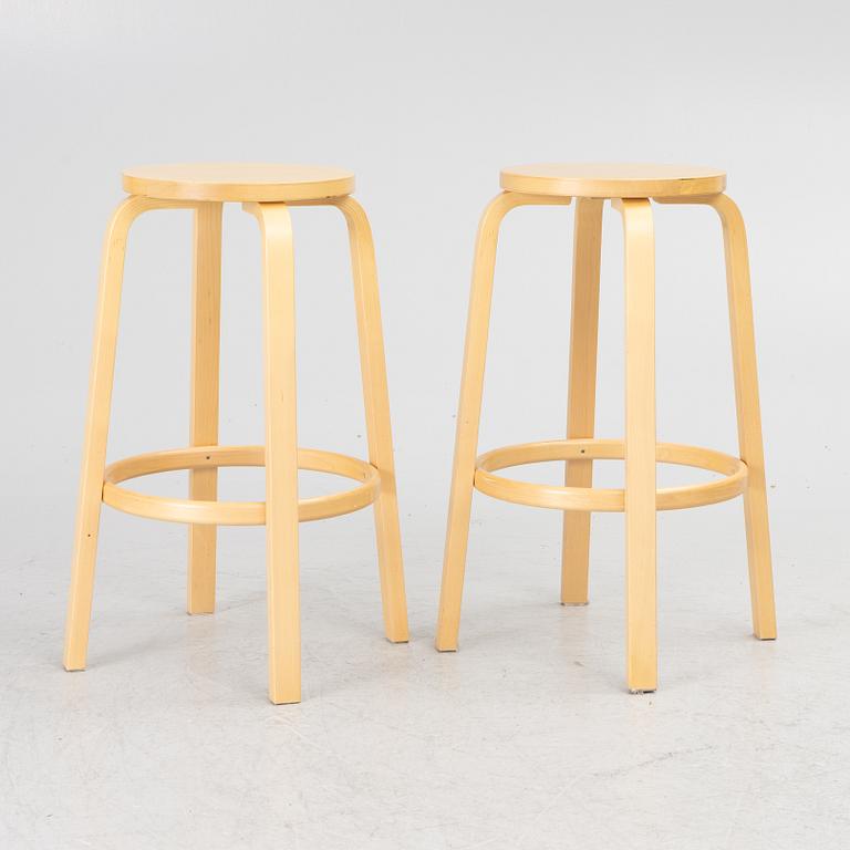 Alvar Aalto, a pair of bar stools, Artek, Finland, 2002.