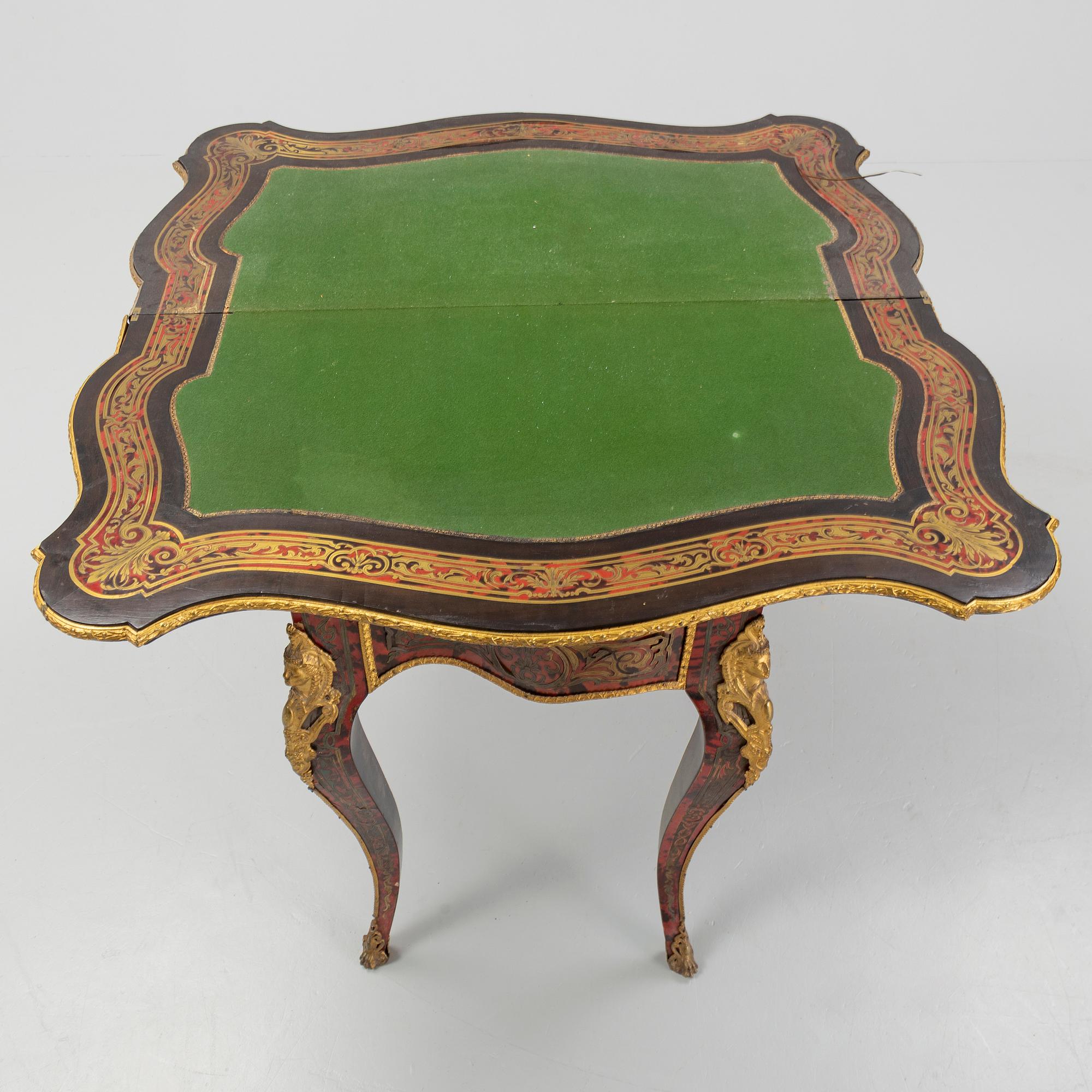 A Boulle style card table, end of the 19th Century.