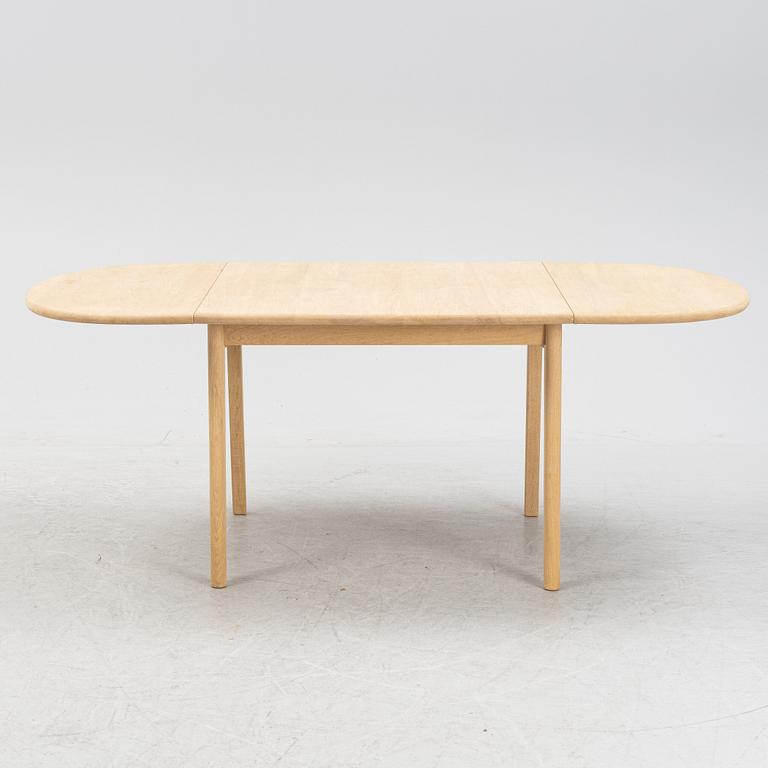 Hans J Wegner, an oak dining table model 'CH002' Carl Hansen & Søn, Denmark.