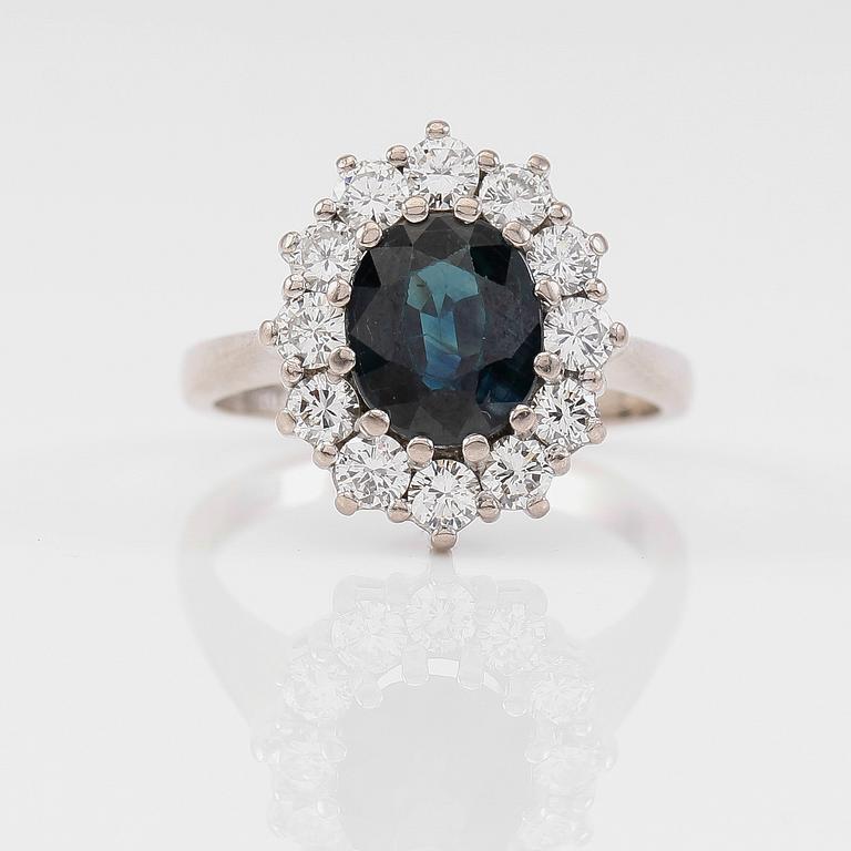 RING, 18K vitguld, blå safir, briljantslipade diamanter tot ca 1.00 ct, svenska stämplar SGG, Stockholm 1991.