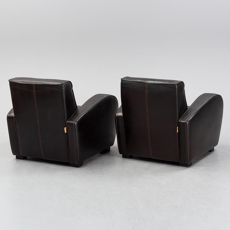 A pair of Italian leather armchairs from  Industria Divani e Poltrone, 21st-century.