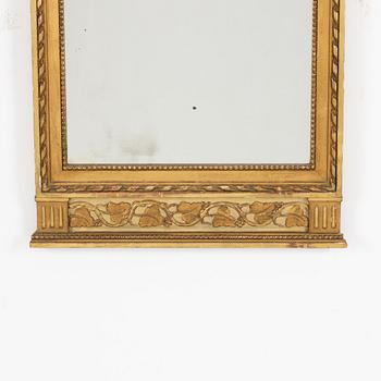 A Gustavian style mirror, circa 1900.