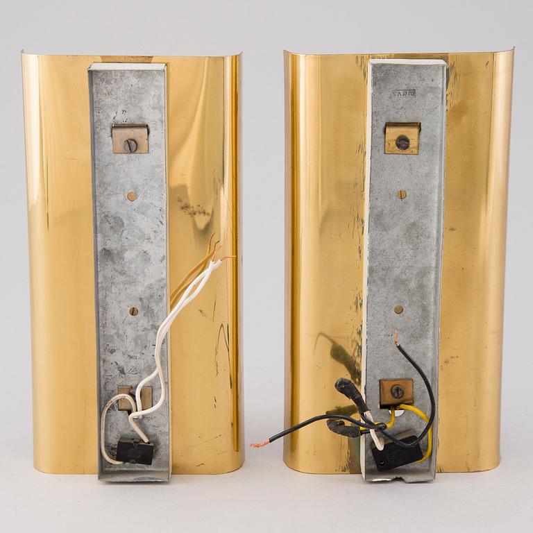 A pair of mid 20th century wall lights for Aris, Arisuo, Finland.