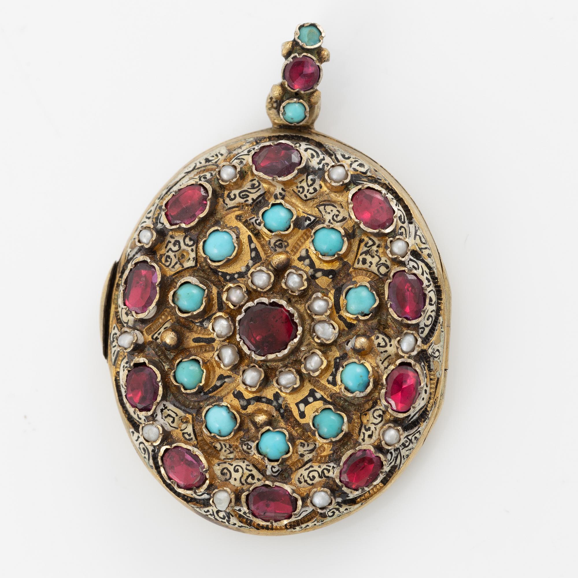 Medallion with enamel details, pearls, turquoises, and pink stones.