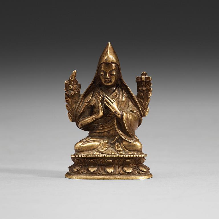 A seated bronze figure of Tsong Khapa, Tibet, 19th Century.