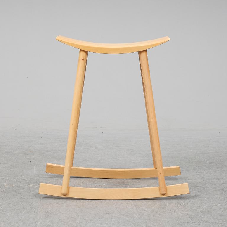 PER SUNDSTEDT, a wood rocking stool from Pyra.